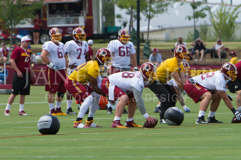 RGIII and Colt McCoy practicing under center/QB exchange.